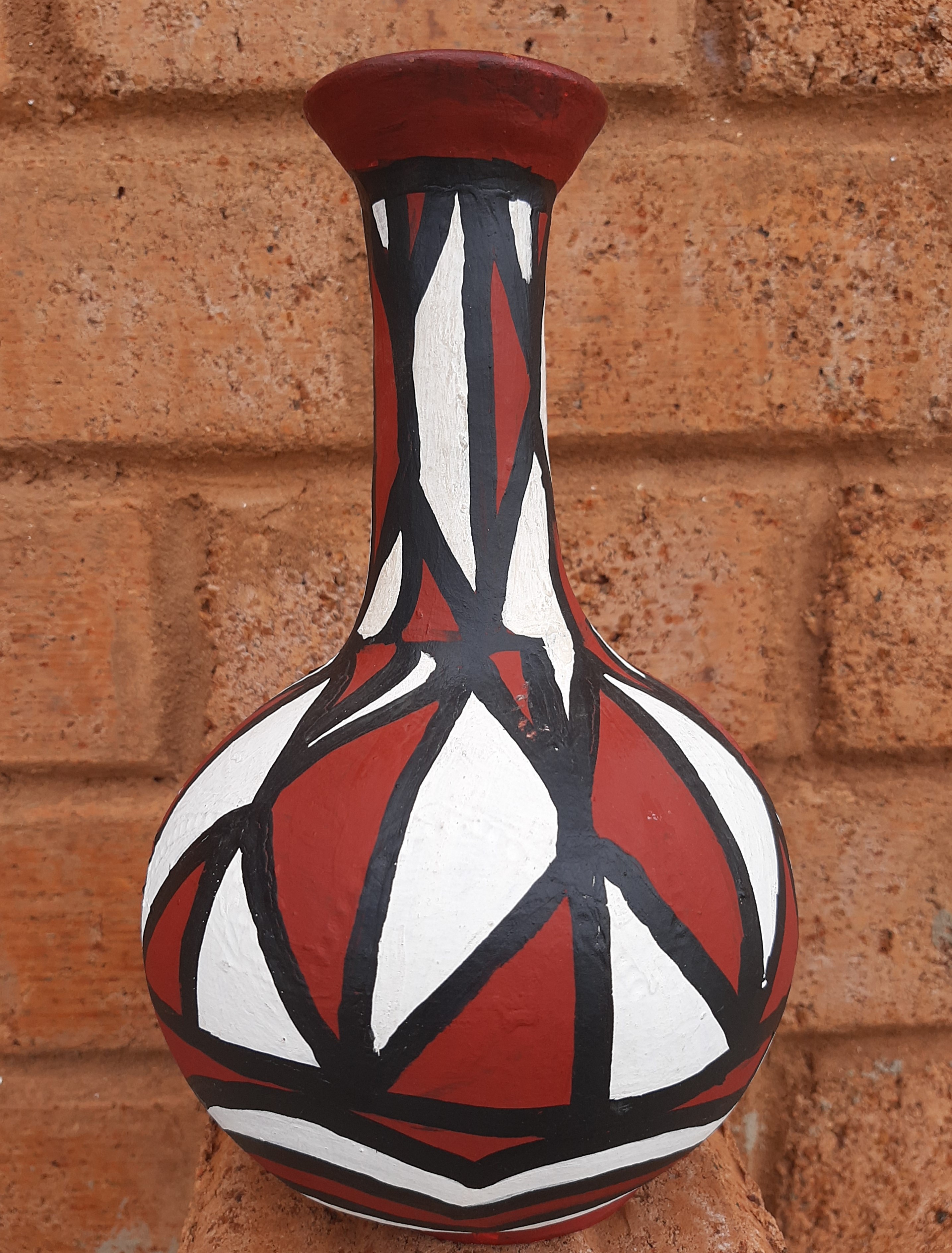 This beautifully made African pot is used as the image of the African Discourse Studies group on DiscourseNet to symbolise an African folktale of how knowledge spread through world for the advancement of humanity. 'Anansi and the pot of wisdom' is the title of the story, which is fondly told in West Africa. This group studies, collaborates and share insights of African discourses with the rest of the world for better relationships and support for one another.